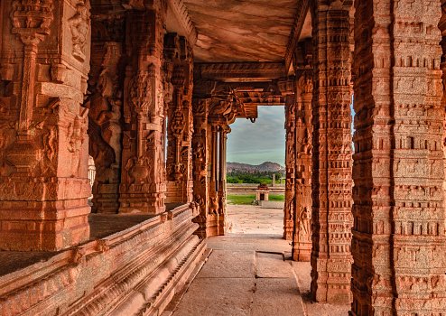 vithala temple interior hampi ruins antique stone art from a unique angle image is taken at hampi karnataka india. The most impressive structure in Hampi, it is a splendid example of rich architecture.