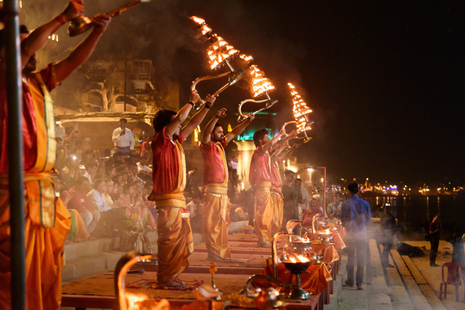 Varanasi, India - March 16, 2019: Ganga aarti ceremony rituals at Assi Ghat in Varanasi