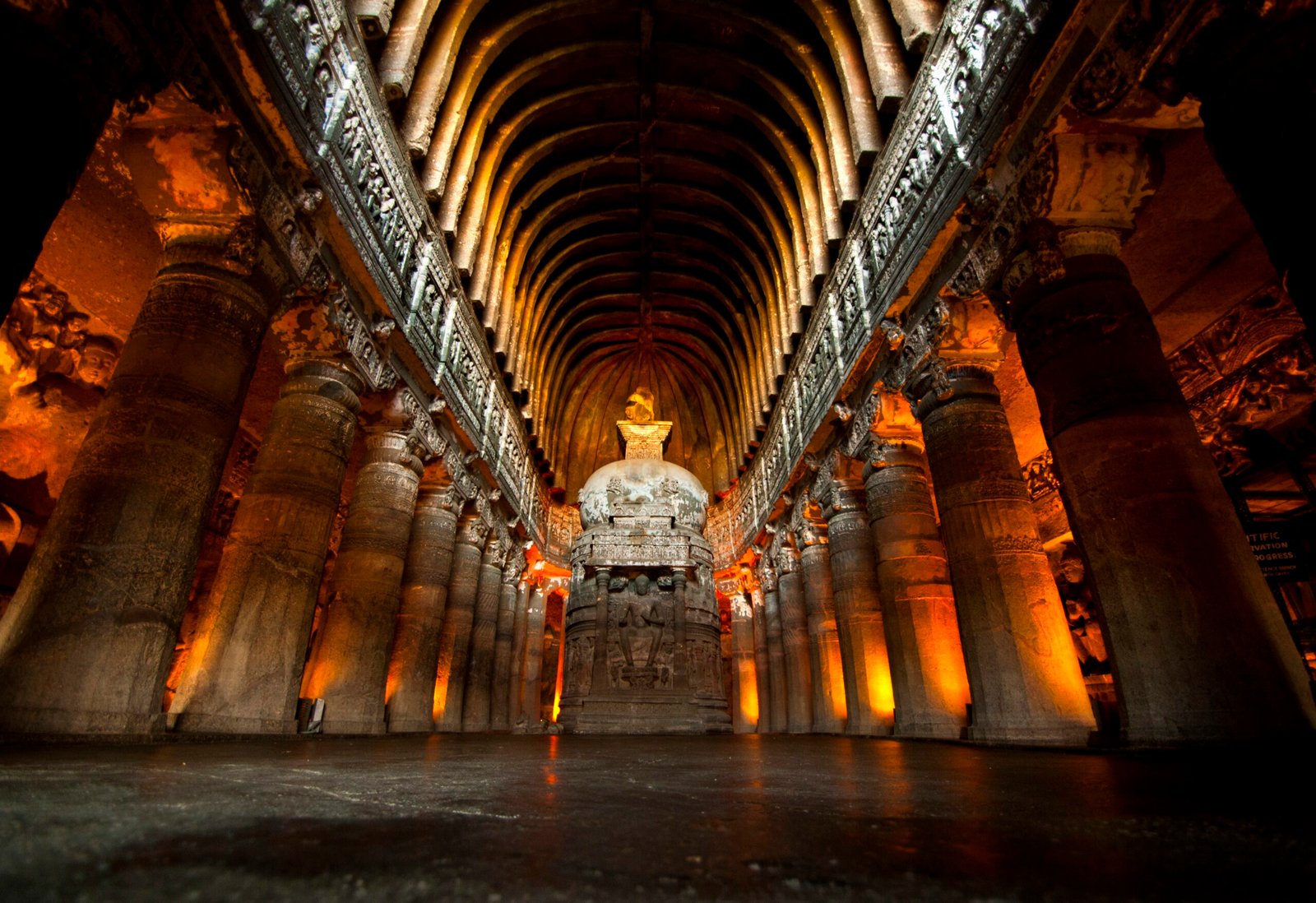 Ancient Buddhist rock temples cut into the cliff at Ajanta near Aurangabad, India. 2nd Century BC to 6th Century AD.